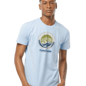 Young man wearing a light blue t-shirt with a circular Forest Lake logo on the chest.